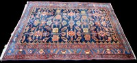 Lot 994 - A Malayer rug, the blue ground decorated with...