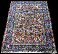 Lot 1005 - A Bakhtiari rug, decorated with full floral...