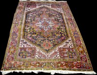 Lot 1006 - A Heriz carpet, with bold geometric design,...