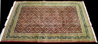 Lot 1012 - A Bidjar carpet, the red ground with small...