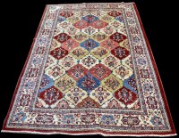 Lot 1016 - A Tabriz carpet, with panels of floral sprays,...