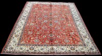 Lot 1017 - A Tabriz carpet, with scrolling floral design...