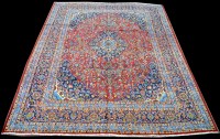 Lot 1018 - A Mashad carpet, the full scrolling floral...