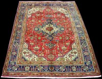 Lot 1019 - A Tabriz carpet, with geometric floral design,...