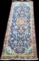 Lot 1025 - A Surok runner, the blue ground with floral...