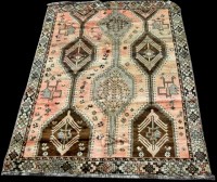 Lot 1026 - A Quashqai rug, with stylized flowers and...