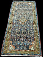 Lot 1031 - A Hamadan runner, with geometric flowerhead...