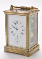 Lot 1054 - A late 19th Century brass carriage alarm clock,...