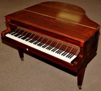 Lot 1058 - A mahogany cased baby grand piano, serial No....