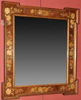 Lot 1082 - An early 20th Century walnut wall mirror...