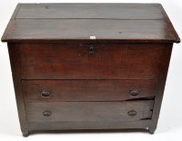 Lot 1083 - An 18th Century oak mule chest, the hinged top...