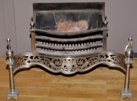 Lot 1089 - An early 20th Century steel front fire basket,...