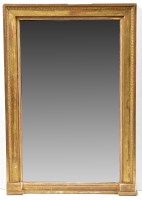 Lot 1099 - An early 19th Century gilt wood wall mirror,...