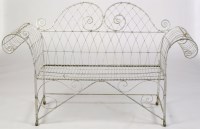 Lot 1101 - A late Victorian scrolling wirework and white...