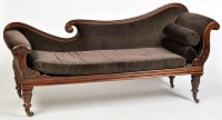 Lot 1109 - A Regency rosewood chaise longue, the shaped...