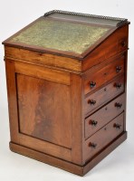 Lot 1112 - An early Victorian mahogany davenport, the...