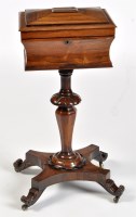 Lot 1113 - A Regency rosewood teapoy, the caddy top...