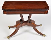 Lot 1120 - A Regency turnover swivel top card table, with...