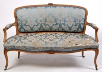 Lot 1123 - A 19th Century French style beech settle, with...