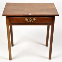 Lot 1138 - A George III oak low boy, the rectangular top...