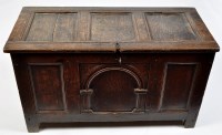 Lot 1143 - An early 19th Century oak coffer, the plain...