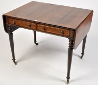 Lot 1145 - A Regency rosewood sofa table, with inlaid...