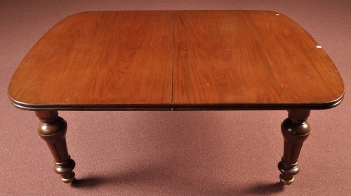Lot 1147 - A Victorian extending mahogany dining table,...