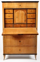 Lot 1159 - An early 19th Century German flame birch...