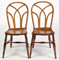 Lot 1161 - A pair of early 19th Century Windsor chairs,...