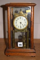 Lot 476 - A brass anniversary mantel clock, stamped...