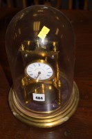 Lot 484 - A brass skeleton and anniversary clock by...