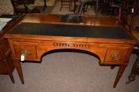 Lot 708 - A stained wood modern desk, the top with...