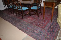 Lot 739 - A Persian Tabriz carpet, the open claret field...