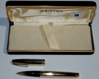 Lot 18 - A Sheaffer Targa fountain pen, in gold...