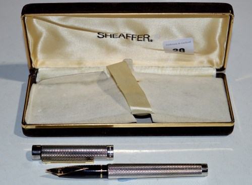 Lot 20 - A Sheaffer fountain pen, in silver plated...