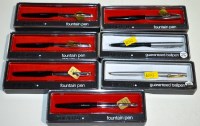 Lot 39 - Five Sheaffer fountain pens in plastic cases,...