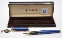 Lot 42 - A Parker Laque lapis lazuli case fountain pen,...
