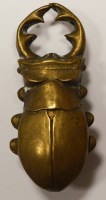 Lot 55 - An early 20th Century brass dung beetle...