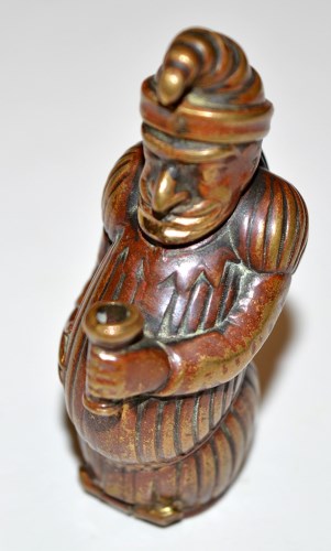 Lot 66 - An Edwardian cold painted brass Mr. Punch...