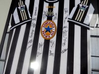 Lot 113 - A Newcastle United replica football shirt,...