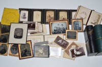 Lot 131 - A large quantity of ambrotypes and other black...