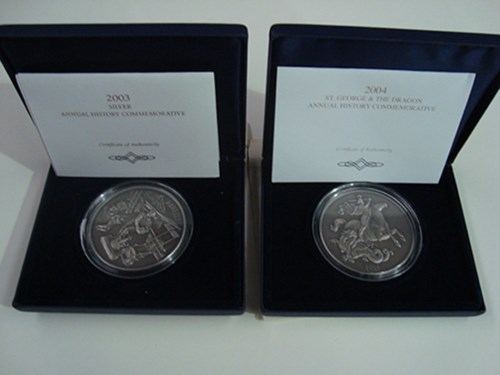 Lot 201 - Two annual history commemorative silver coins,...