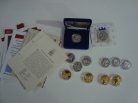 Lot 203 - A quantity of silver £5 proof and other coins,...