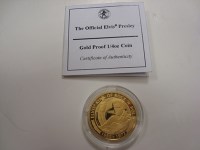 Lot 228 - An Elizabeth II 50 dollar gold coin from the...