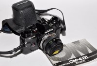 Lot 358 - An Olympus OM-4Ti SLR camera (black), fitted a...