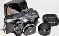 Lot 359 - An Olympus-Pen F half-frame SLR camera...