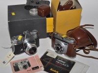 Lot 377 - A Kodak Retina Reflex III 35mm camera, fitted...