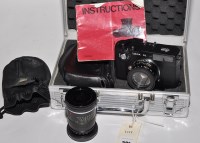Lot 381 - A Leica CL rangefinder camera, with Summicron...