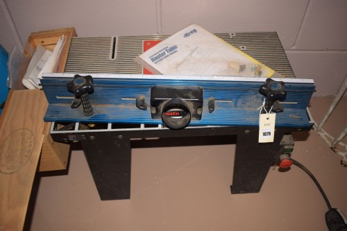 Lot 1079 - A Kreg precision bench-top router table, with...
