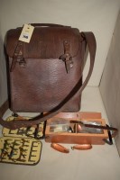 Lot 1170 - A leather bag, containing; tins of fishing...